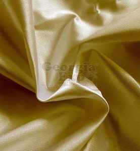 Poly Knit Drape spun gold