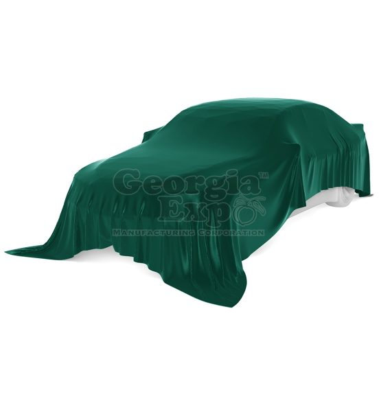 car with green unveiling cloth