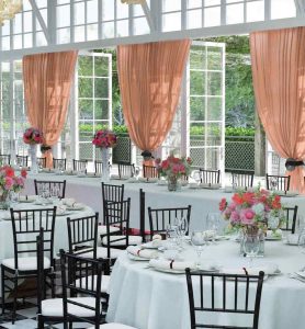 sheer drape coral wedding set up